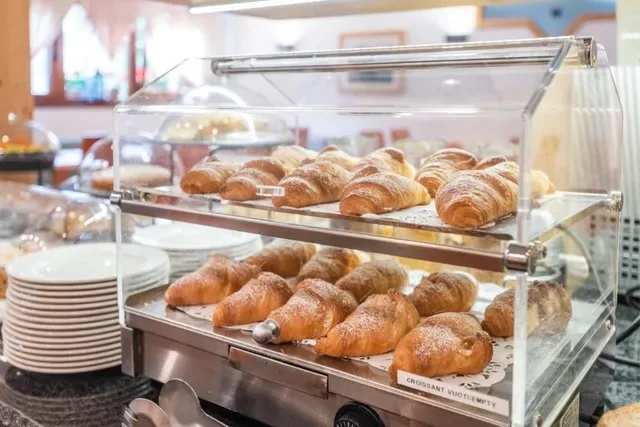 Breakfast buffet shown with the Hotel Alpina offer