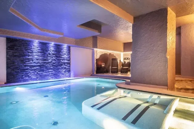 Indoor pool shown with the SportHotel Romantic Plaza offer