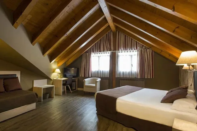 Bedroom shown with the Hotel Himalaia offer