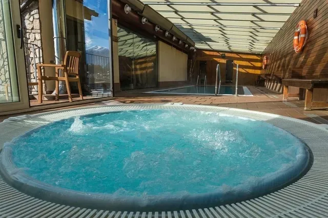 Indoor spa pool shown with the La Massana offer