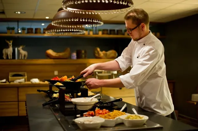 Chef preparing food at Skistar Lodge
